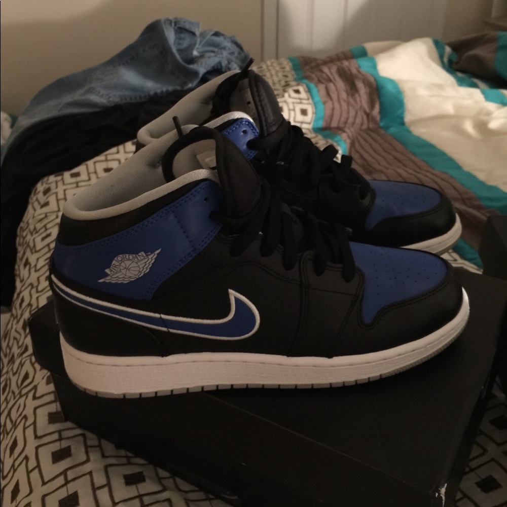Two pair of Jordan 1 mid